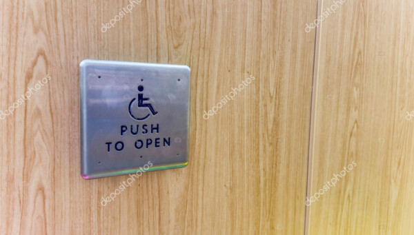 depositphotos 746668622 stock photo close wheelchair door restroom